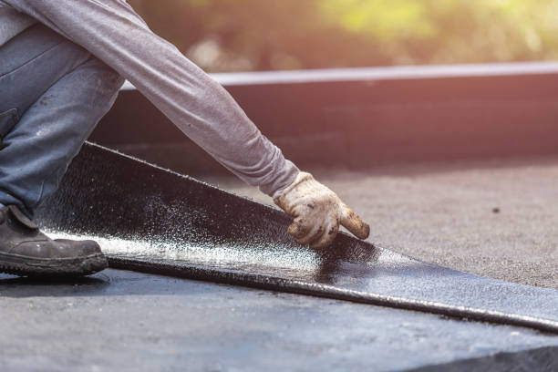Professional Exterior Waterproofing technician working in Elmont, NY